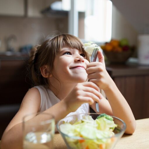 child eating salad, autism support